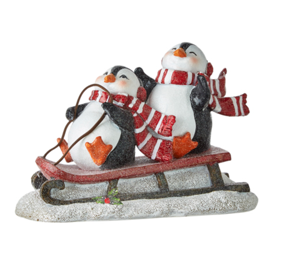 Sledding Penguins